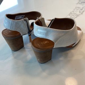 Tom’s heels, purchased at The Buckle, sz 8.5, cream color w side zip, adorbs